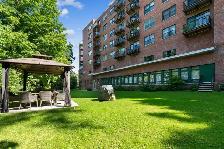 CONDO  4 ½ AVEC VUE PANORAMIQUE IMPRENABLE SUR LE MONT ROYAL