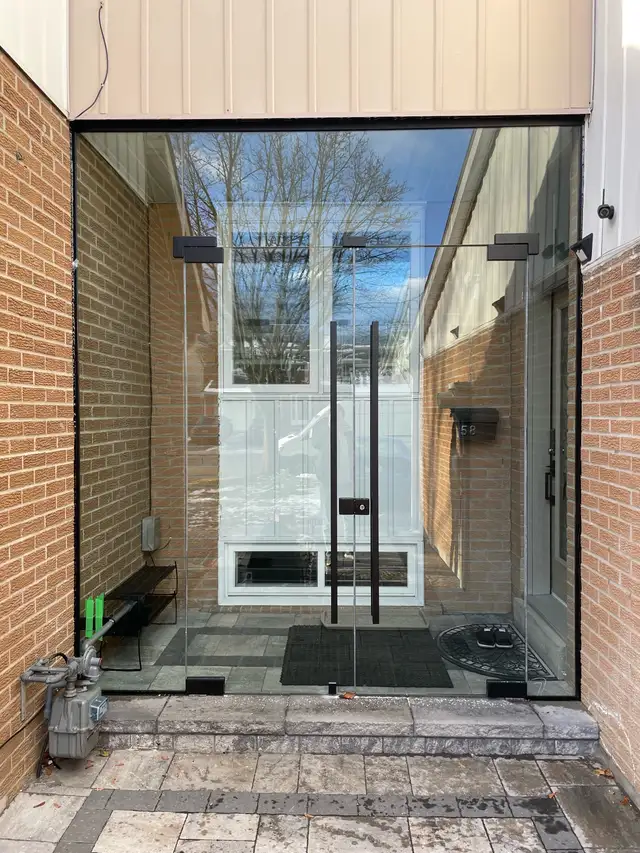 Frameless Glass Entrance Enclosure - Photo 10