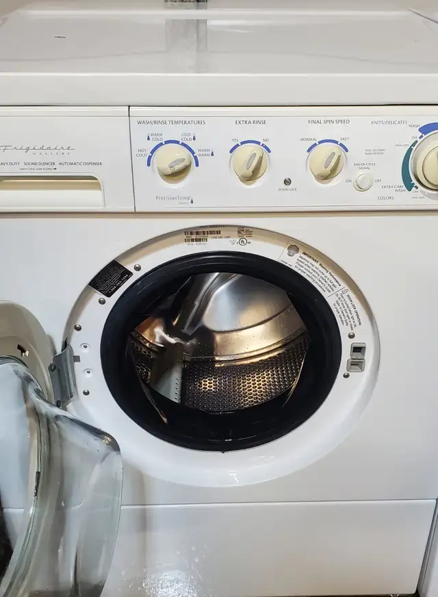 Frigidaire front loading stackable- working, clean - Photo 4