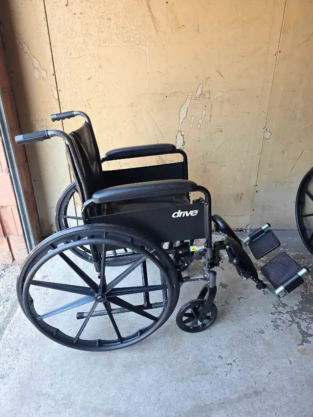 Wheelchair with Elevating Leg Rests - Photo 2