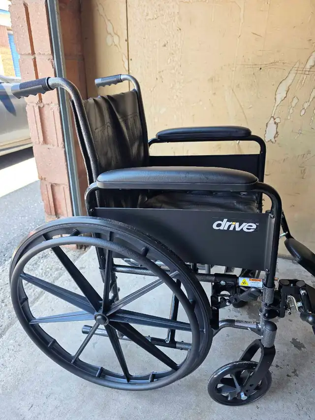 Wheelchair with Elevating Leg Rests - Photo 4