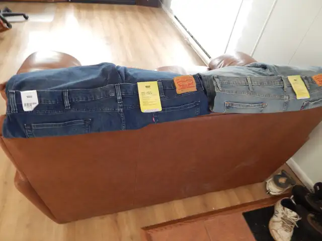 LEVI,S 502 TAPER JEANS. ( NEW) 2 PAIRS