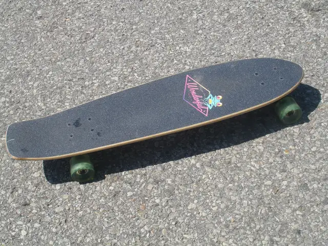 LIKE BRAND NEW 31' SKATEBOARD SOME KIND OF WONDERFUL BRAND!
