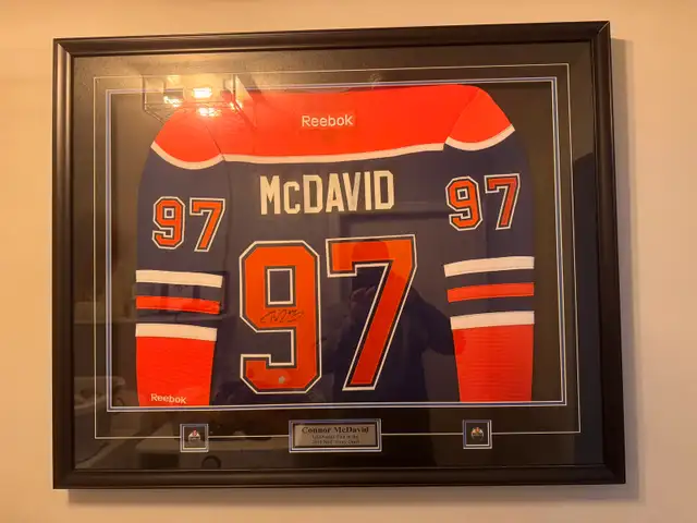 framed/signed Mcdavid jersey