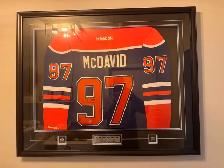 framed/signed Mcdavid jersey
