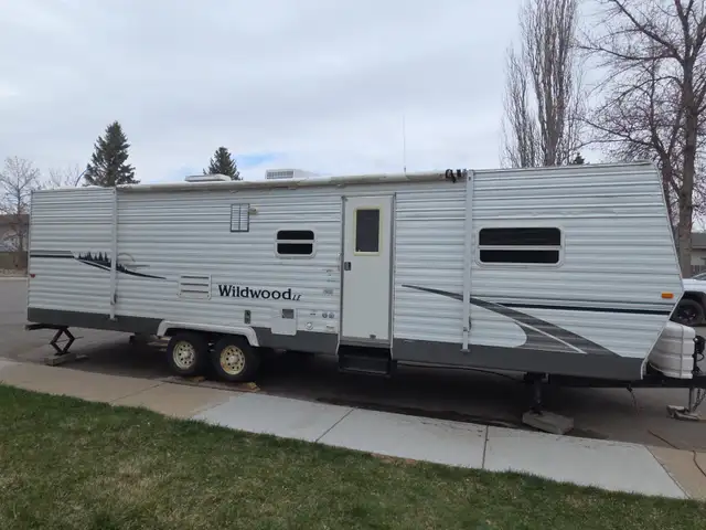 31 foot pull behind camping trailer for sale.