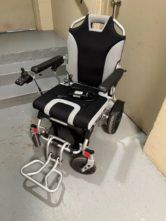 Folding Electric Wheelchair LIKE NEW