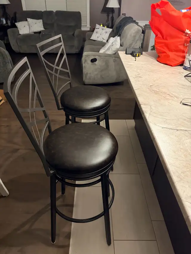 Two kitchen stools for sale for $100 the pair