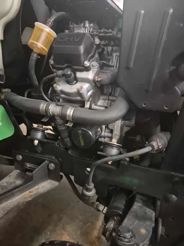 John deere425 hydrostatic 20hp liquide,power stering,chauffage, - Photo 8