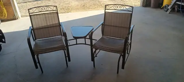 Dual rocker/glider chairs and table set for sale