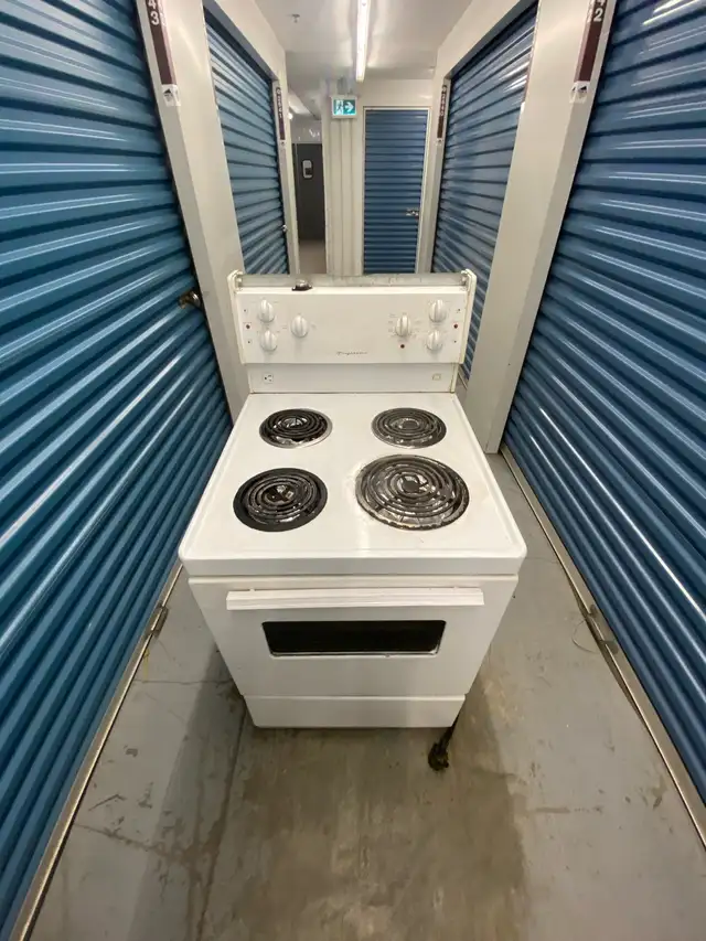 SLIGHTLY USED ELECTRIC STOVE