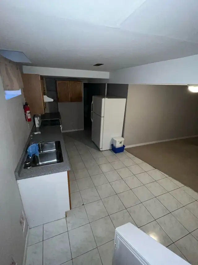 2 BED 1 BATH   DEN BASEMENT APARTMENT FOR RENT - Photo 2