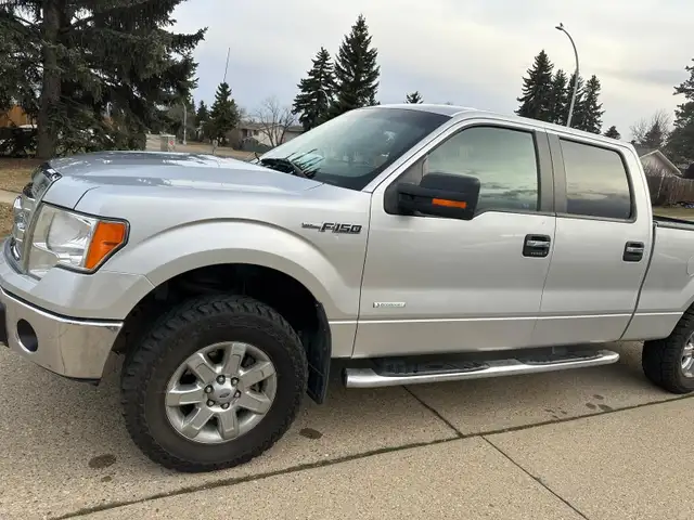 Ford 150 XLT - Photo 3