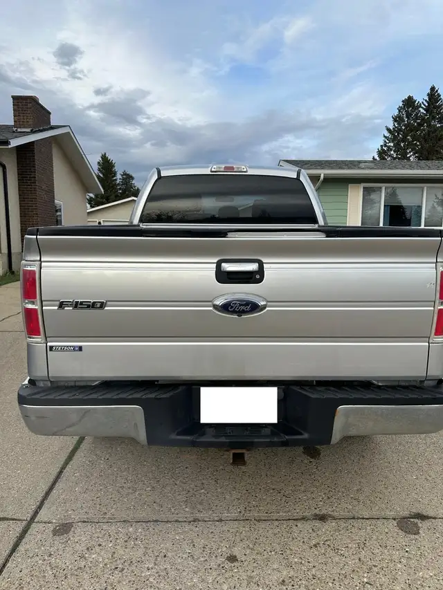 Ford 150 XLT - Photo 6
