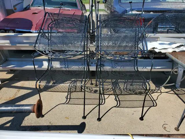 ROD IRON FOUR CHAIRS AND TABLE 1970'S   $400.00