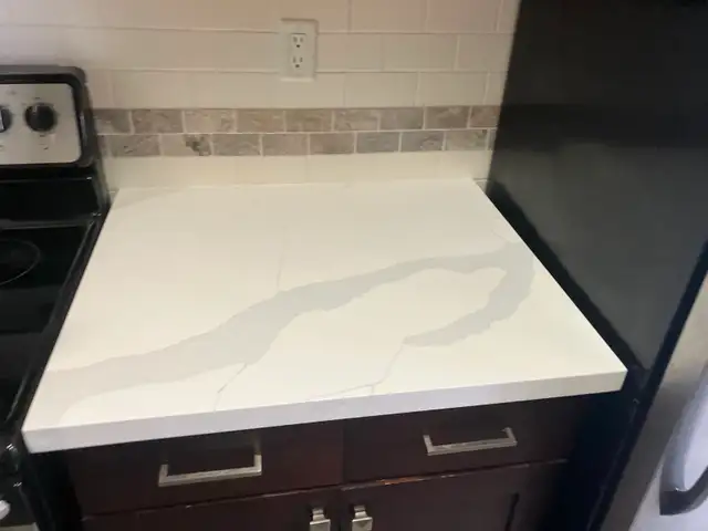 New Quartz Kitchen Countertop with FREE Sink - Photo 4
