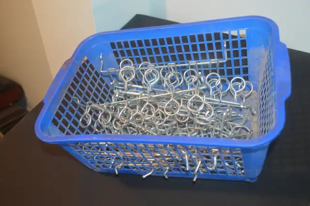 Basket full of New Never used Pegboard Hooks