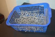 Basket full of New Never used Pegboard Hooks
