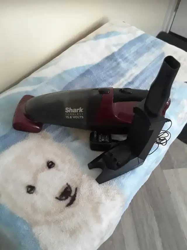 Shark rechargeable vacuum with stand and ac charger $65.00 firm - Photo 3