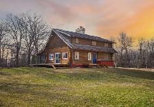 One-of-a-kind 1258sqft log home situated on beautiful 3.1 acres!