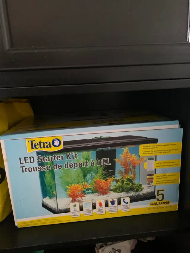 fish tanks five gallon each. New!