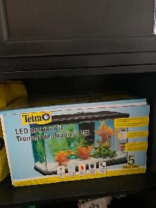 fish tanks five gallon each. New!