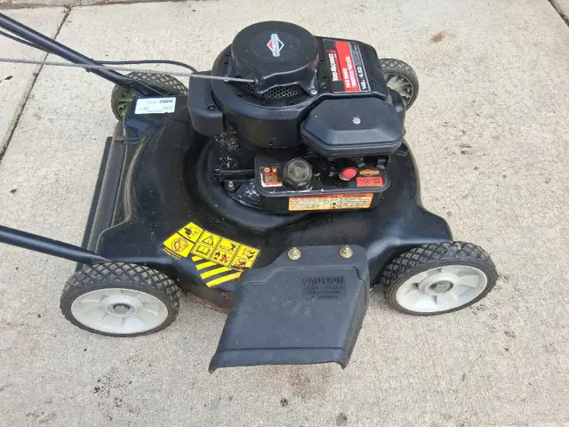Tuned up little push mower in good working condition.