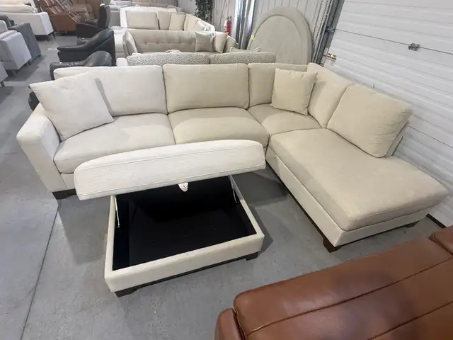 Cream fabric sectional with storage ottoman - Photo 2