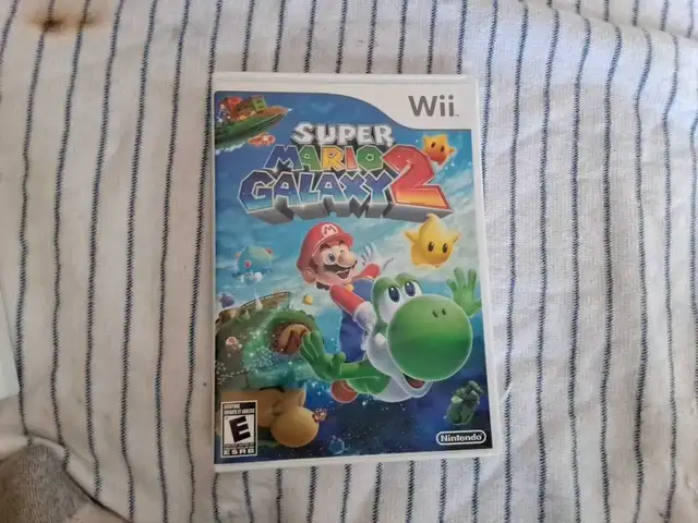 jeux mario galaxy 1 et 2. LIVRAISON POSSIBLE. 20$ chaque - Photo 3