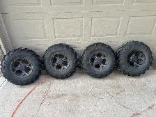 Polaris rims and tires barely used.