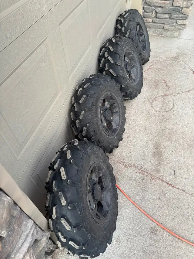 Polaris rims and tires barely used. - Photo 2