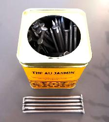 A box of brand new 4-inch nails (over 50pcs)