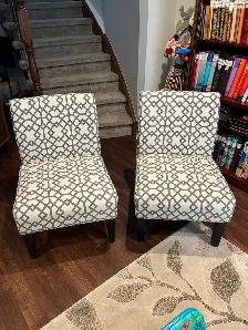 Sharp Accent Chairs in white/grey geometric pattern.