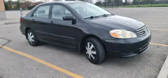 2004 Toyota Corolla Auto AC power locks:/mirrors 416-858-7673