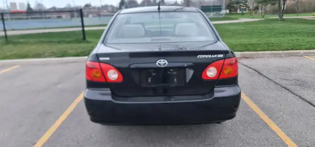 2004 Toyota Corolla Auto AC power locks:/mirrors 416-858-7673 - Photo 10