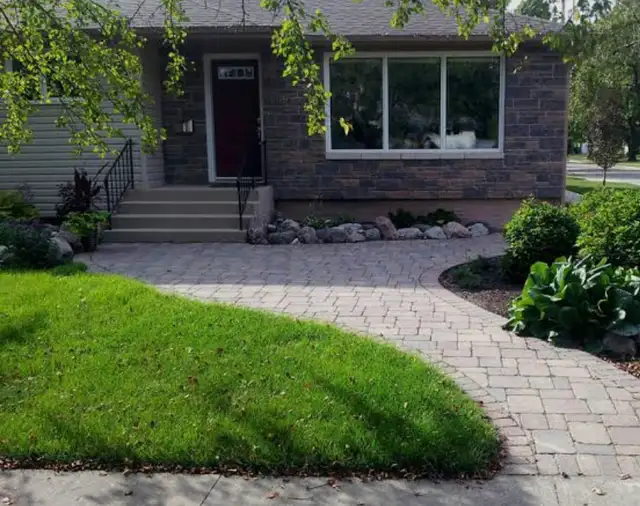 Interlocking and sod  installation - Photo 5