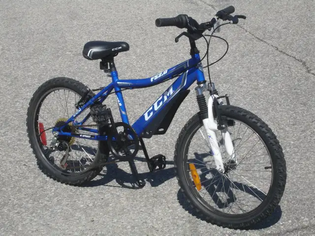 OUTGROWN BOY'S OR GIRL'S 20' CCM FS20 6 SPDS WITH SUSPENSION!