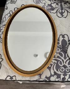 Gold oval mirror $100 (has a small dent at the back)