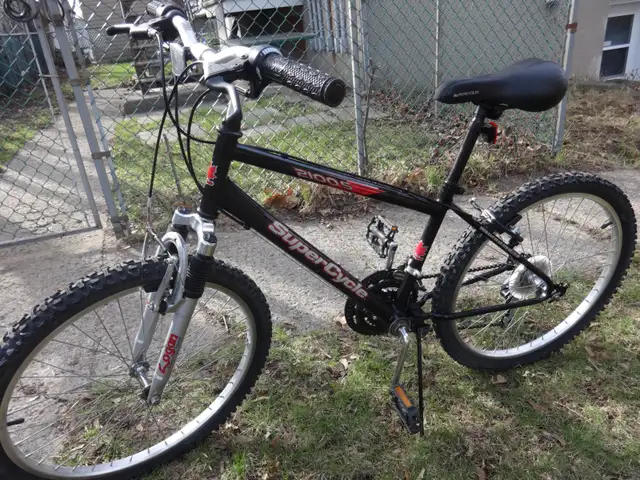 VÉLO SUPERCYCLE,ROUES DE 24 POUCES, SUSPENSION AVANT. PROPRE. - Photo 4