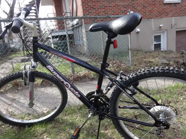 VÉLO SUPERCYCLE,ROUES DE 24 POUCES, SUSPENSION AVANT. PROPRE. - Photo 6