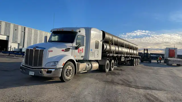 Flatbed Class 1A Driver – $27–$34/hr or 25% Gross – Cross Border - Photo 9