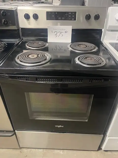 Cuisinière stainless ronds serpentins Whirlpool