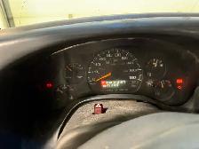 Eavestrough machine and cube van