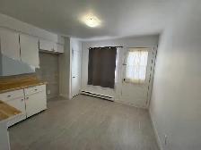 Grand Logement 4½ ensoleillé au rez-de-chaussée - Photo 2