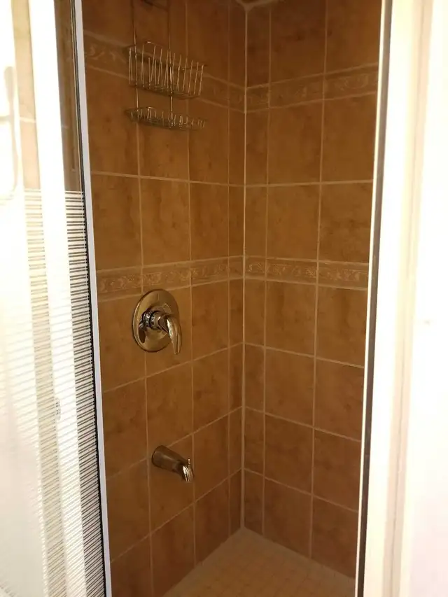 Furnished Bsmt bachelo/Separate entrance/Utilities included - Photo 6