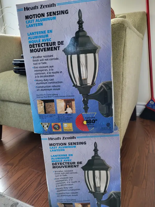 Motion lights for outside - new - two pair.