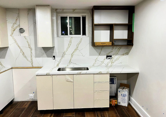 White Kitchen Quartz Countertop - With Big Golden Veins - Photo 3