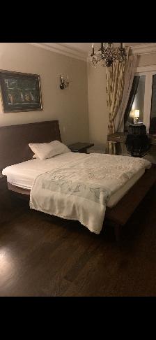 Solid wood queen bed with two side tables from berrymoor