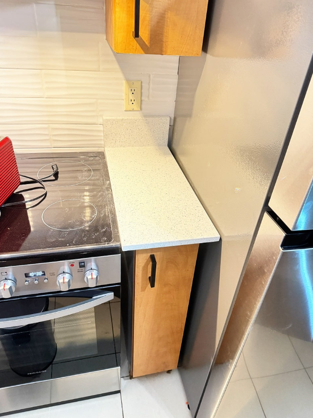 Orange Granite Marble Countertop With Black little Shades - Photo 5