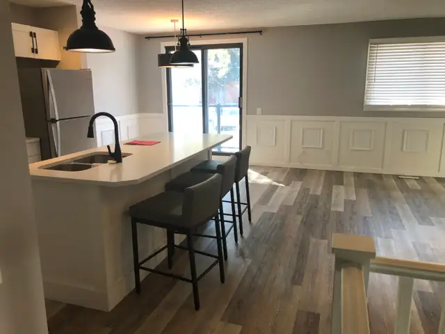 Updated 2 bed 2 bath Killarney 4-plex w/ balcony - $1895